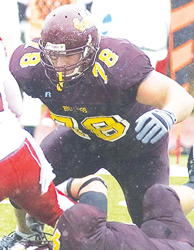 Dropping In <span class='credit'>Photo Courtesy of FSU Photo Services</span><span class='description'>Dropping In: Former DT Jake Visser making a tackle against Saginaw Valley on November 8th, 2008.</span>
