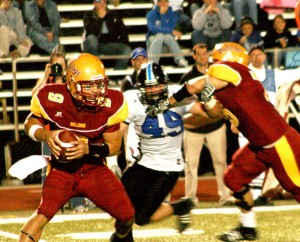 #9 Tom Schneider <span class='credit'>Photo By: Kate Dupon | Photographer</span><span class='description'>#9 Tom Schneider makes his way toward the end zone in Saturday’s game against Grand Valley. Ferris’ losing streak continued, with a 17-10 loss.</span>