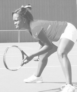 Tabitha Simpson Stands Ready for Anything <span class='credit'>Photo By: Kate Dupon | Photographer</span><span class='description'>Tabitha Simpson stands ready for anything at the match against Lake Superior State on Friday, working toward her 6-4 and 6-3 wins against Carolyn Pumford.</span>