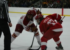 Lewicki facesoff against Miele