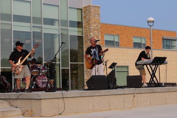 The David Yonker Band rocks the stage in front of the University Center on Aug. 30.